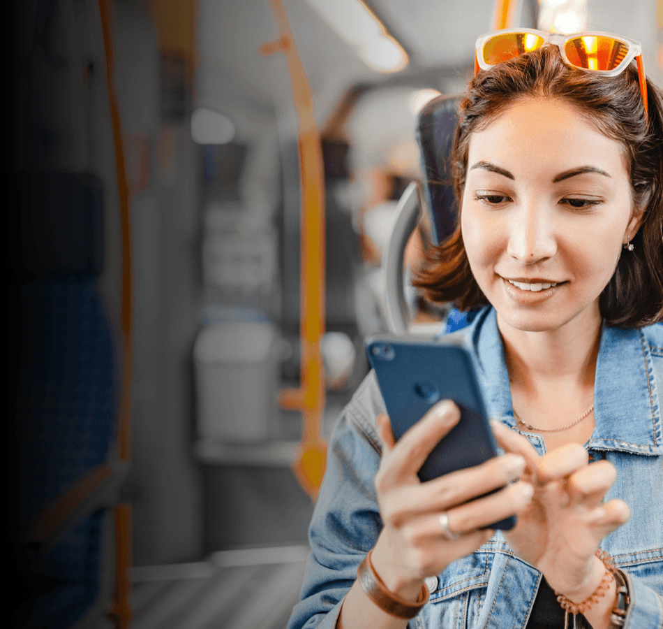 Audience - Woman playing Candy Crush on her smartphone