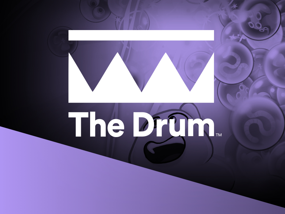The Drum Logo over a purple background.